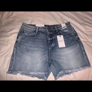 Judy Blue 4 way denim stretch distressed shorts. 4” inseam mid rise never worn.
